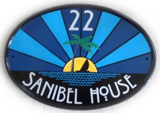 Art Deco style house plaque - the customer asked for an art deco style radiating sun with an island and palmtree and sailing boat painted on a New World classic oval. The font is an art deco period font called Willow. Painted by Gerry