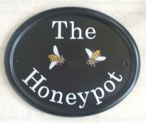Two Bees - The customer asked for just Two bees on the sign - we tried to persuade the customer to have a pot of Honey as well, but he insisted on just the bees. Painted by Gerry