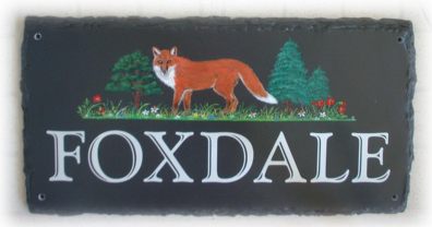 Fox in dale - pictorial was painted by Jean on a Large Two Line natural base plaque. The font is called Goudy Handtooled.