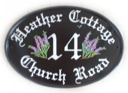 Heather sprigs - the customer asked for Old English Text and a sprig of Heather on either side of the number -painted by Jean on a New World classic oval