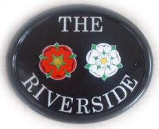 Lancashire & Yorkshire rose emblems painted on a Large classic oval - font is called Century Schoolbook