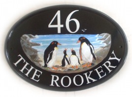 Penguin Family - Painted on a New World Classic Oval by Jean 