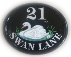 White Swan - Painted by Jean on a large classic oval base plaque from her own design. Font is Tiffany