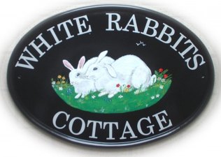 White Rabbits sign - Painted on a Nerw World classic oval base plaque by Jean - font is Century Schoolbook