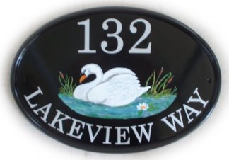 White swan sign - the base plaque is a New World classic oval and Jean painted a white swan. The font is called Century Schoolbook